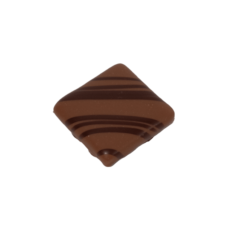 Mit Salbeipüree verfeinertes Rahm-Caramel umhüllt von Grand Cru Milchschokolade - Max Chocolatier