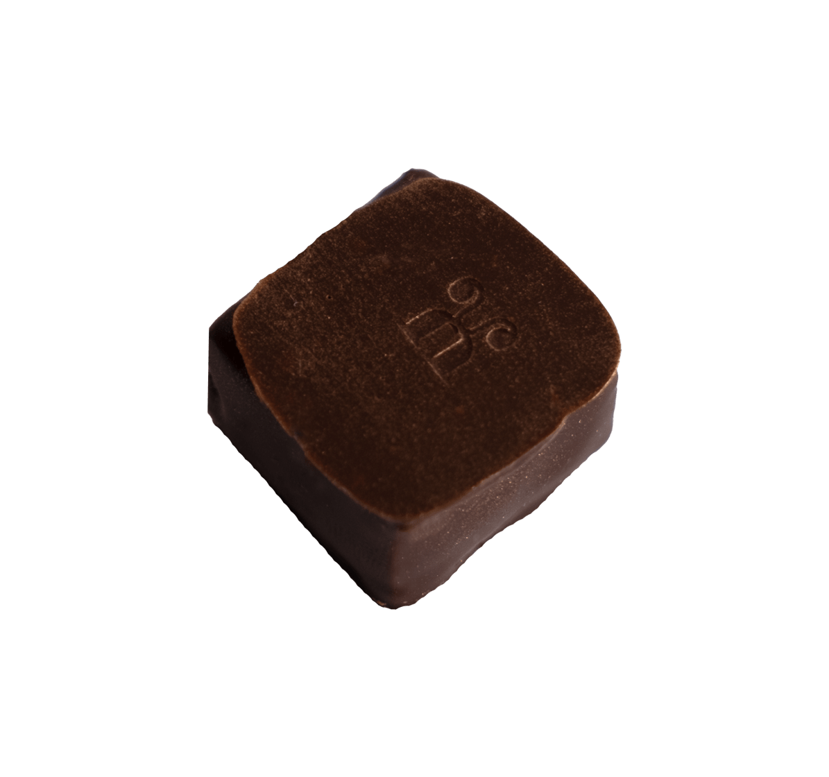 Handgemachte Schnittpraline mit Brinen und Cashew Gianduja überzogen mit Milchschokolade - Max Chocolatier