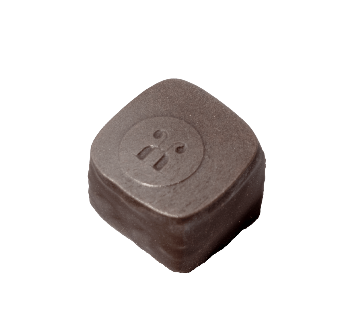 Handgemachte Schnittpraline Marzipan aus Macadamia und Mandeln umhüllt von dunkler Schokolade - Max Chocolatier